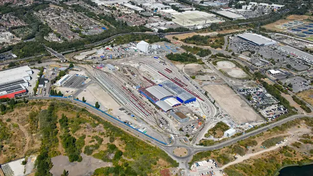 Aerial view of the open storage plots beside the DLR depot at Beckton Gas Works